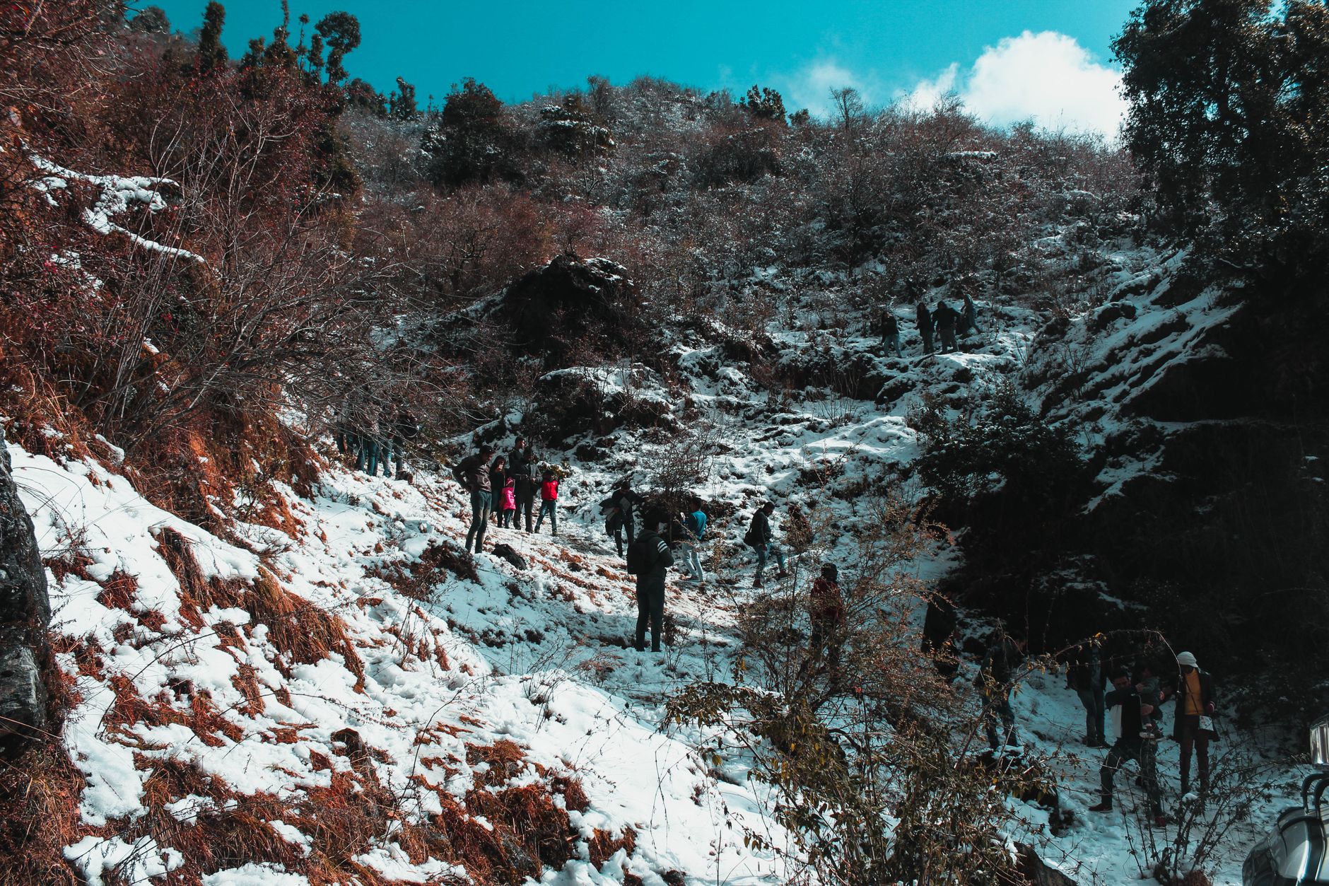Trekkers walking toward snow-capped Himalayan peaks during the best time to visit Nepal